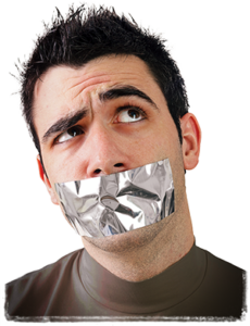 Photo of an attractive Master gagged with silver duct tape. He is looking quizzically up and to the right as if to say, "How is this supposed to work?"