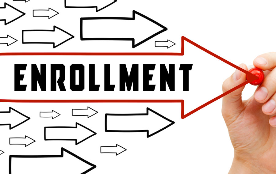 Illustration of a hand drawing an arrow forward labeled "Enrollment" with a marker.